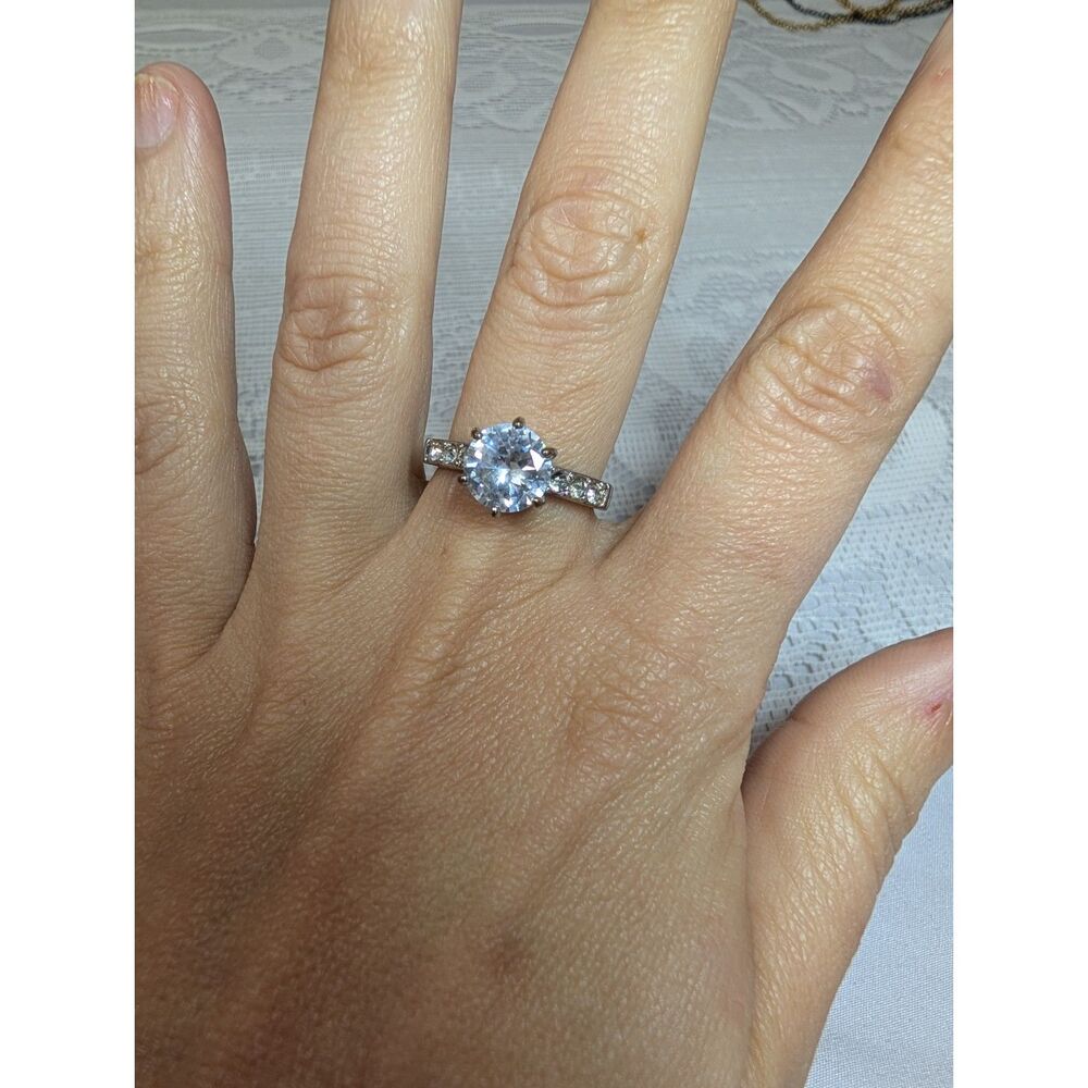 Classic Round Brilliant Accented Solitaire Statement Ring